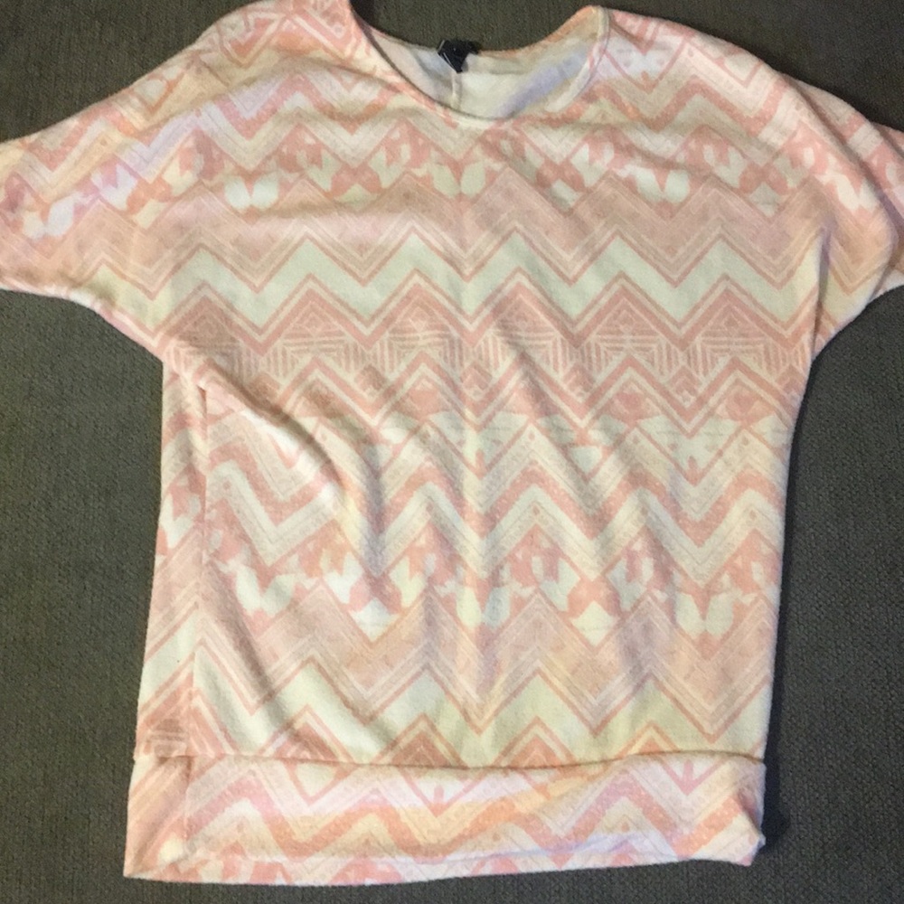 A light pink chevron blouse from Rue 21